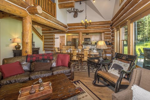 Warm, comfortable seating in this log cabin chalet | Main Level