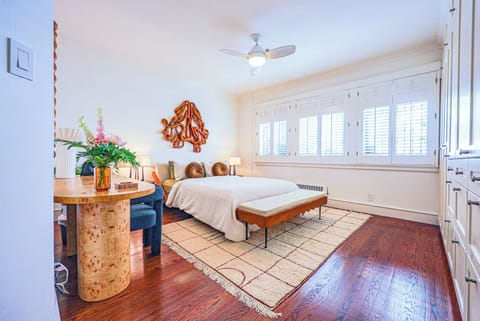 Primary bedroom has tremendous natural light and space along with work desk