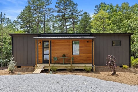 Step inside this charming wood-clad tiny house.