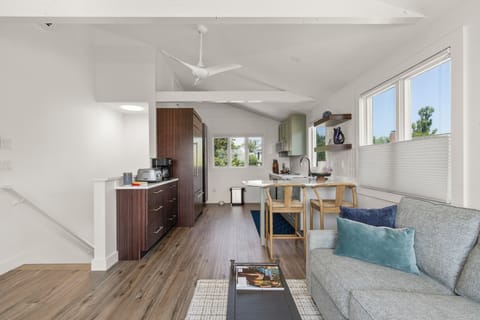 This inviting space opens directly to the private deck.