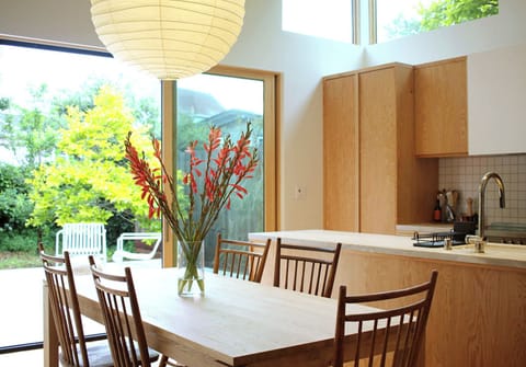 Expansive sliding doors facilitate easy indoor-outdoor living