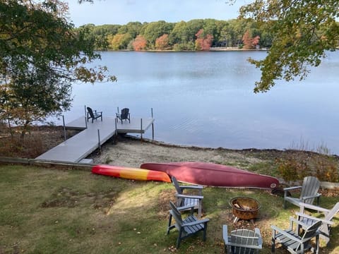 Swimmable pond w/ private dock, large deck, grill, firepit & adironack chairs 