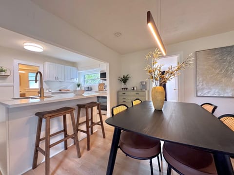 open floor plan living, dining & kitchen