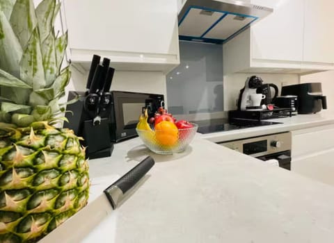 Fully equipped with oven, dishwasher, and cookware.