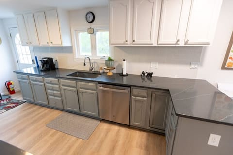 Stainless steel appliances including dishwasher, microwave, oven/stove and refrigerator