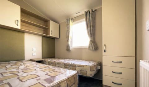 This is bedroom 1 slightly larger then bedroom 2 this has 2 single beds in sleeps 2 people.