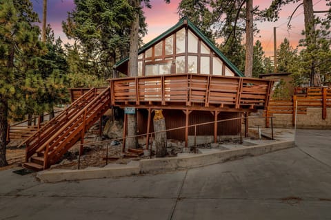 Arrive with ease using the private driveway, located just steps from the front door. Please note that the main entrance is accessed via exterior stairs, adding to the classic mountain-cabin feel.