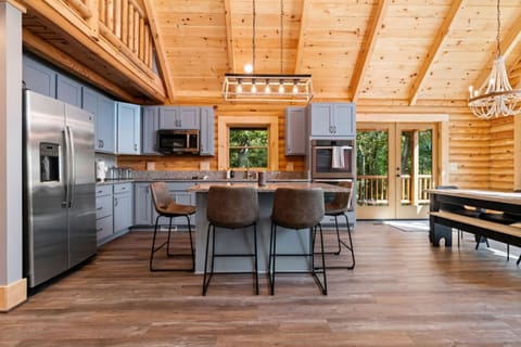 Kitchen has bar seating for 4