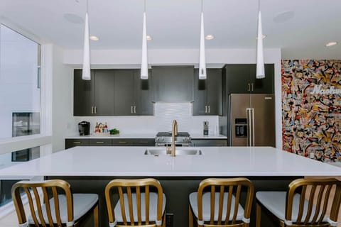 Cook up a meal or gather around the island with friends!