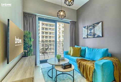 Unwind in the inviting living room, a comfortable space for lounging and unwinding after a day of adventures.