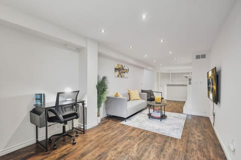 Sleek design meets function. This bright, modern space is perfect for work and relaxation. Enjoy the dedicated desk area and unwind on the comfortable sofa after a day out. Your stylish home away from home awaits.