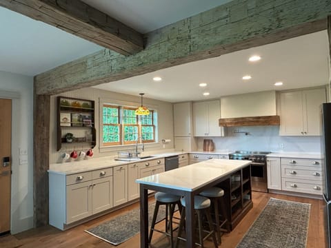 Kitchen, view 2. Mountains and farmfields are visible from the kitchen sink