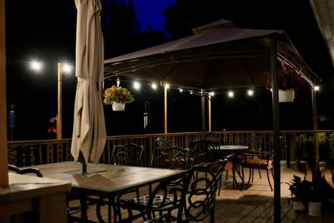 Relax- you are on vacation after all! The elevated deck perfectly looks over the private, spacious backyard. Turn on the edison lights to make your experience extra special! 
