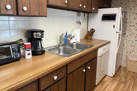 Our kitchen features ample cabinetry and all the essentials for a gourmet vacation meal.