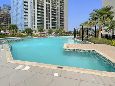 Pool Paradise: Dive into luxury with this sparkling oasis surrounded by lush greenery!