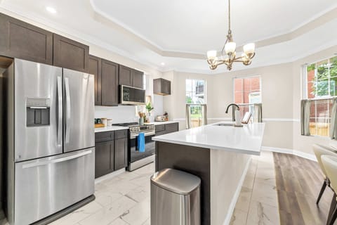 This chic kitchen invites you to unleash your inner chef and entertain in style.