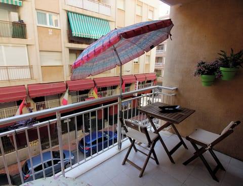 large terrace with small sea view