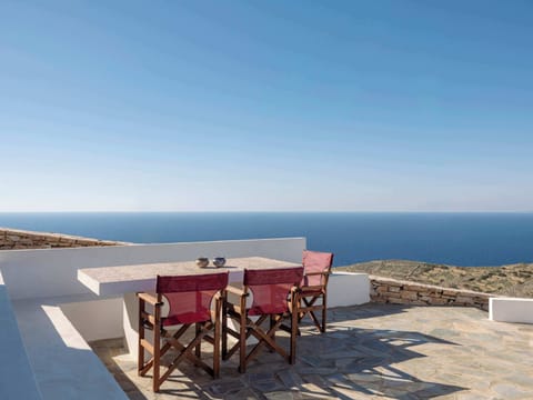 Spacious sea-view terrace with outdoor dining—perfect for morning coffee by the Aegean.
