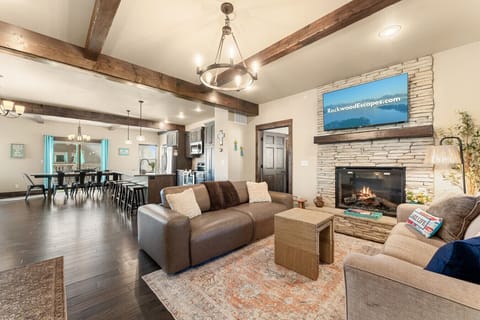 The heart of the home. Our expansive living area is designed for the whole group to gather, offering plenty of plush seating and an open layout that keeps everyone connected