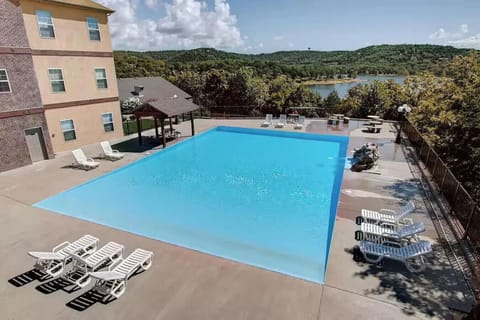 A second nearby resort pool only a short walk from the cabin, offering plenty of loungers and a great spot for kids to play and cool off.