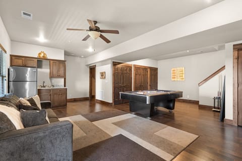 Fun-filled game room featuring pool, ping pong, foosball (newly added), and a Golden Tee 3D arcade game.