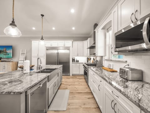 Spacious, stylish, and fully stocked with everything you need to cook, serve and enjoy!