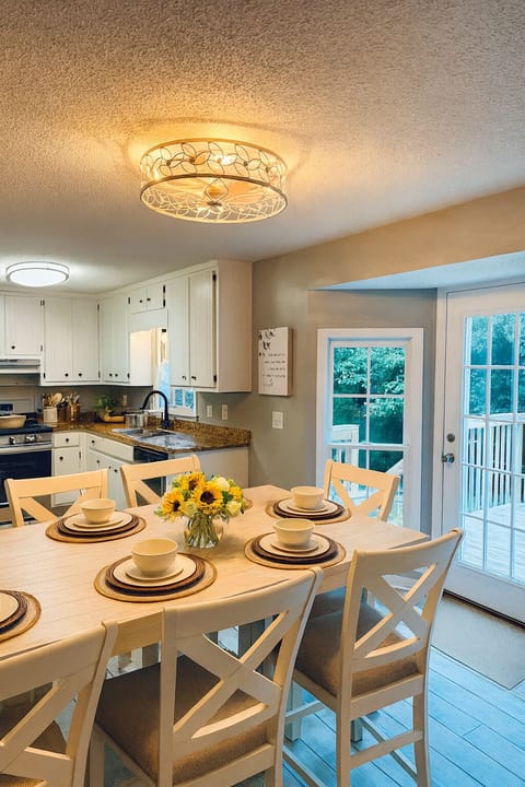 “Bright dining area with seating for the whole group