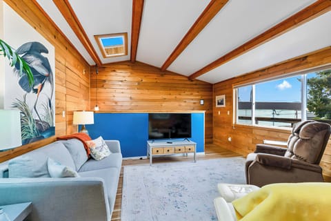 Living room with cedar walls.