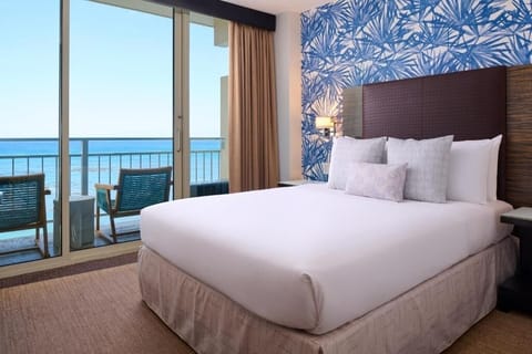 Wake up to ocean breezes and balcony views from bed.