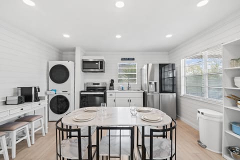 Full Kitchen with Dining area & Laundry
