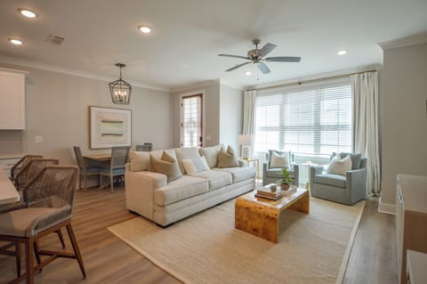 Stylish living area with ample seating for the entire family.