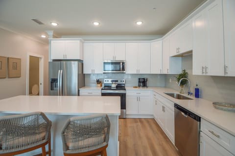 Kitchen includes baking sheets, mixing bowls, and all other cooking items.