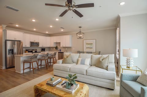 The living room ties nicely into the kitchen area.