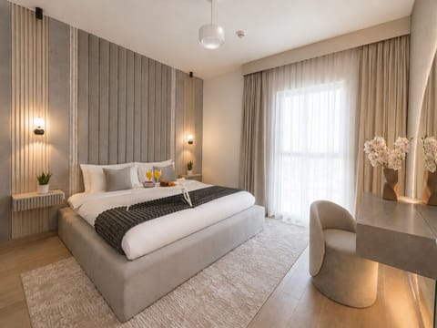 Luxury bedroom room at Waters Edge, Yas Island, Abu Dhabi, UAE. Space designed professionally by an interior designer with custom made furniture. Offering a 5-star hotel experience .
