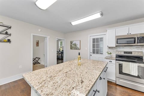 Open Kitchen. Sleek, spotless, and stocked for every craving.