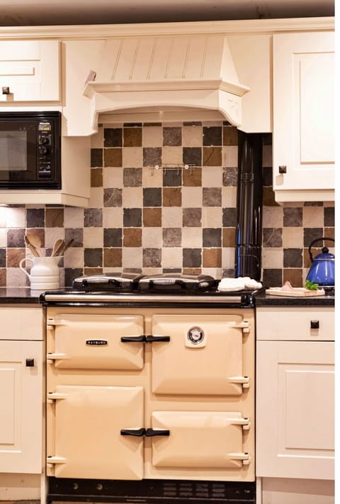 Kitchen, Cabinetry, Drawer, Kitchen Appliance, Design, Wood Stain, Hardwood, Kitchen Stove, Stove, Tile