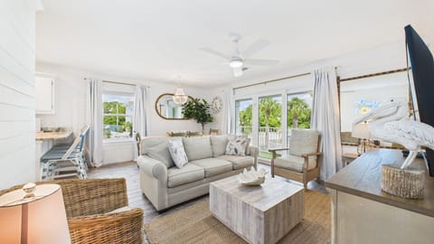 Open concept living area with stylish furnishings