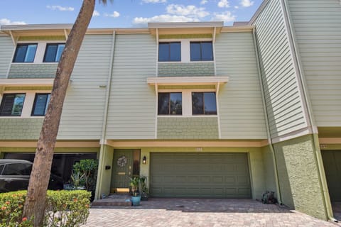 Beautiful exterior with pavered driveway and 2 car garage.
