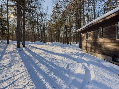 Direct snowmobile trail access just steps from the cabin, offering seamless ride in and ride out convenience exclusive for guests.