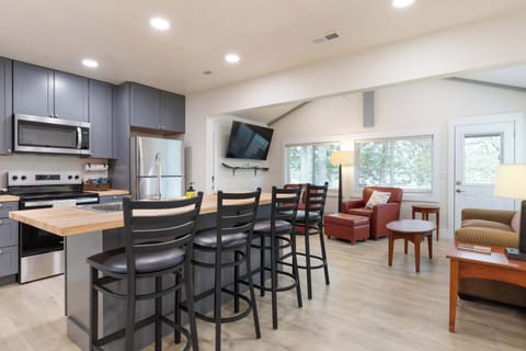 Kitchen with view of the living room