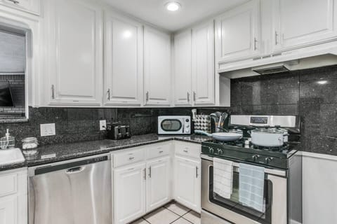 Dishwasher, microwave, toaster, spices, cooking utensils, cooking set.