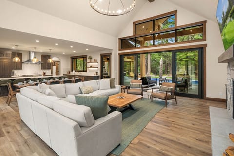 1 More Pool Day. - Open concept great room with double slider doors leading to back patio!