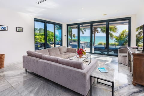 Soak up ocean breezes through expansive glass doors all day.