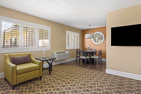 Gather for conversation in an open, airy living space.