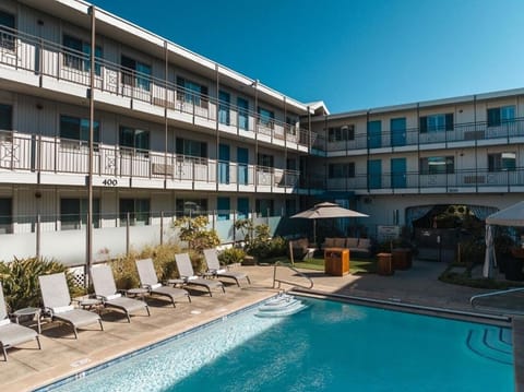 Soak up sunshine beside the sparkling pool and loungers.