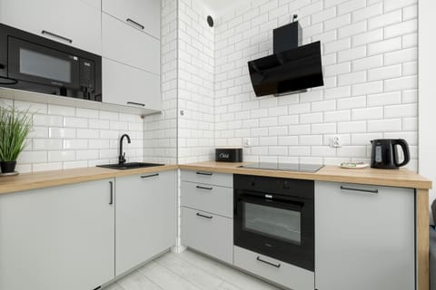 The fully equipped kitchenette includes everything you need for a home-cooked meal.