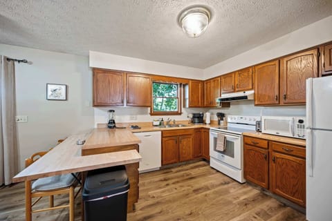 The inviting kitchen offers ample space & all the comforts of home