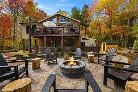 Private woodland retreat with fire pit, large deck, and barrel sauna
