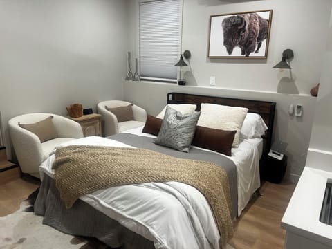 Comfortable Queen bed and chairs