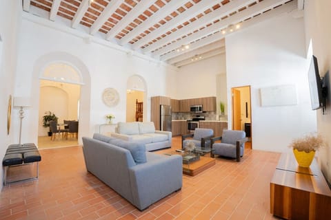 The comfortable and spacious living room is the perfect place to unwind after a day of exploring.